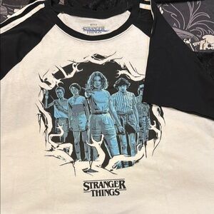 Retired! Stranger Things Raglan tee.